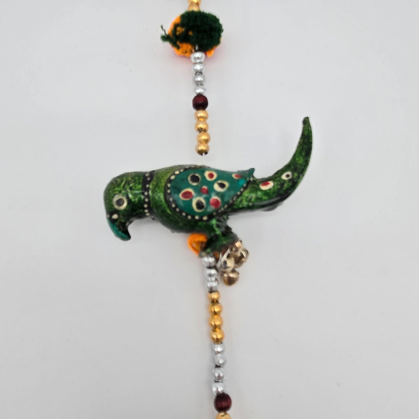 String of Parrots with Bell