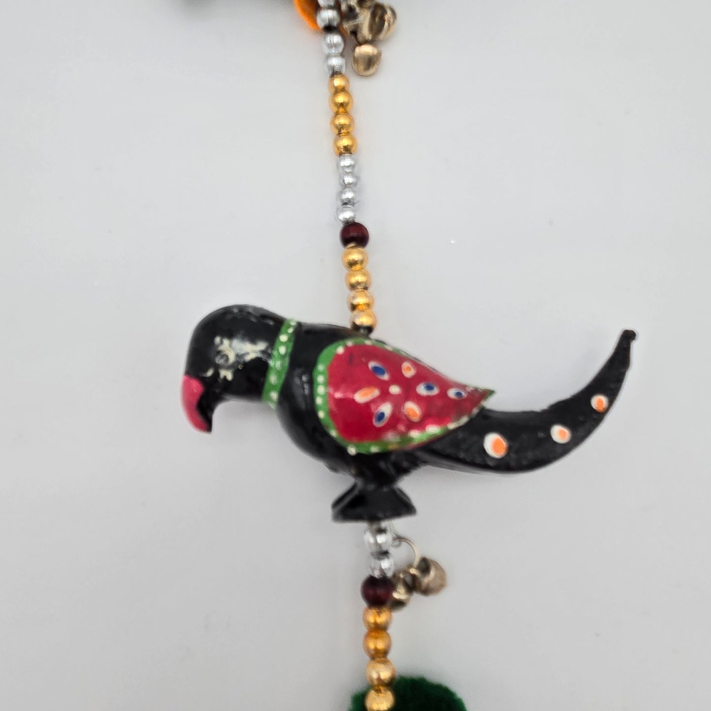 String of Parrots with Bell