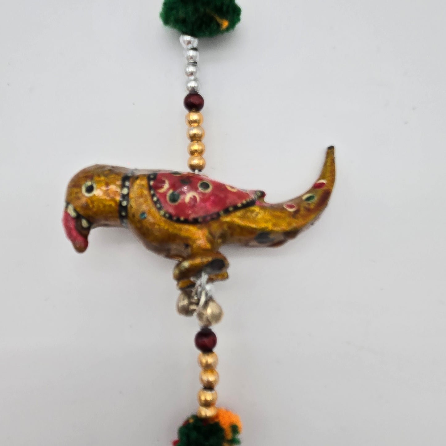 String of Parrots with Bell