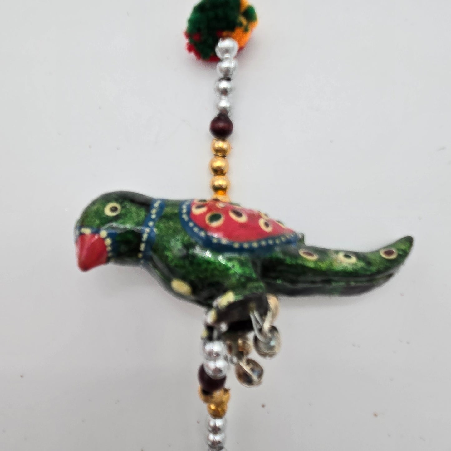 String of Parrots with Bell