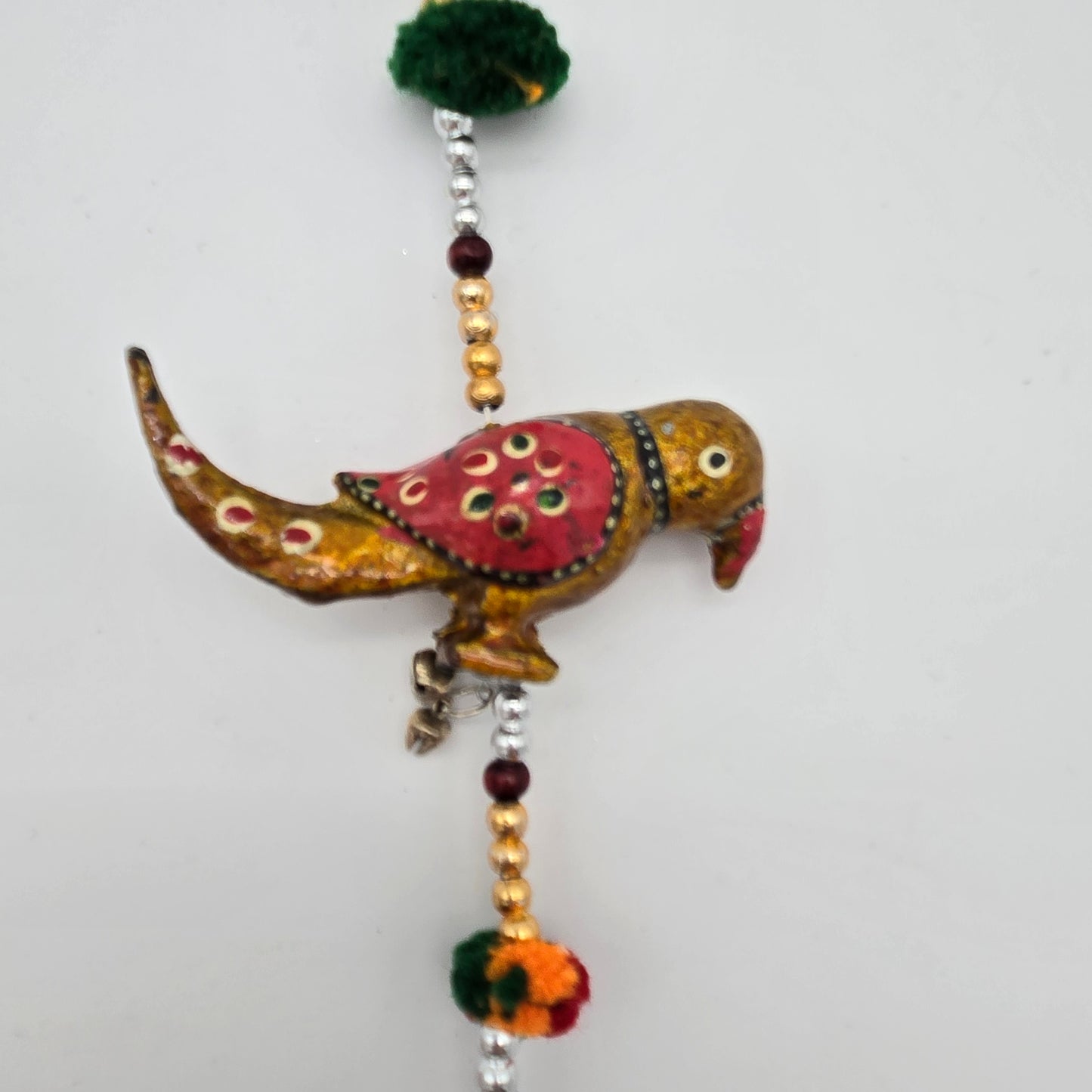 String of Parrots with Bell