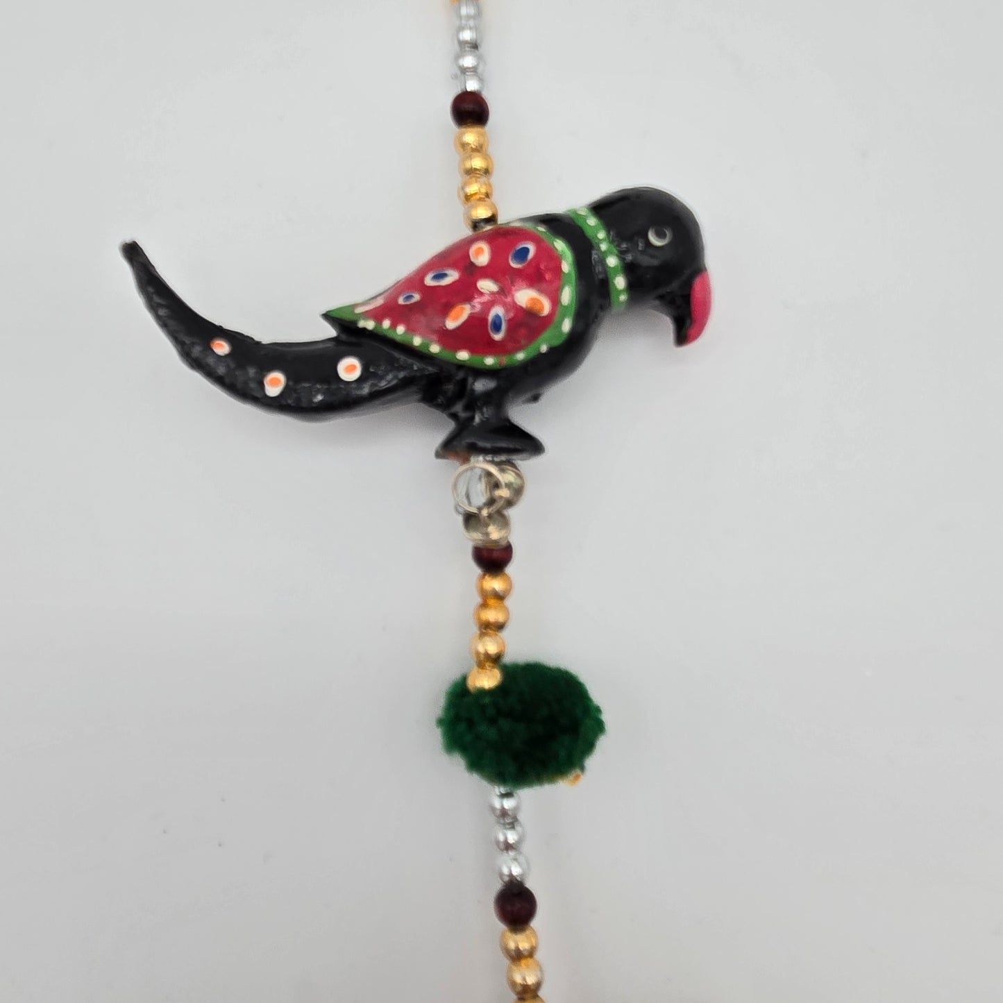 String of Parrots with Bell