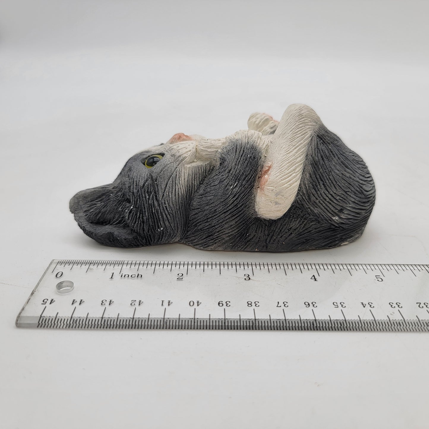 Adorable Black and White Kitten Biting Tail Figurine