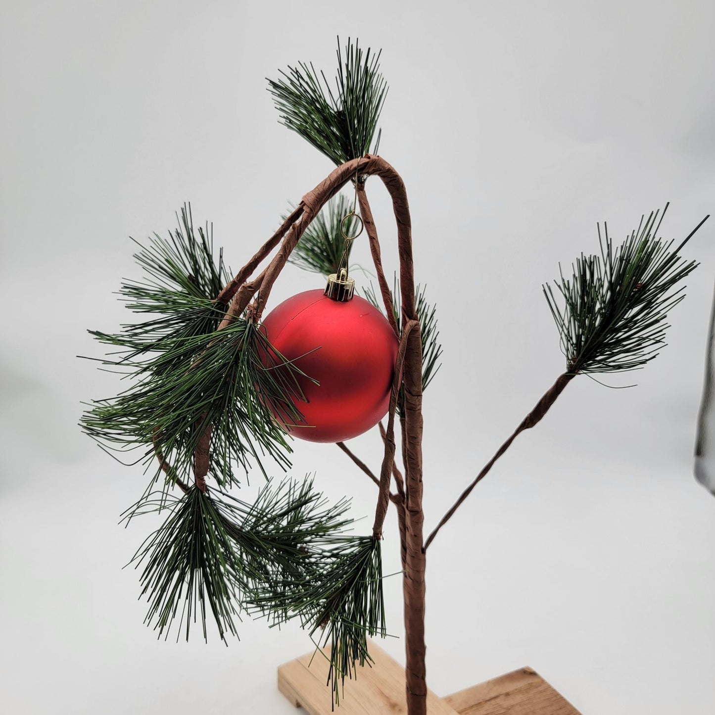 Charlie Browns Christmas Tree 24" Tall With Red Ornament & Wooden Base