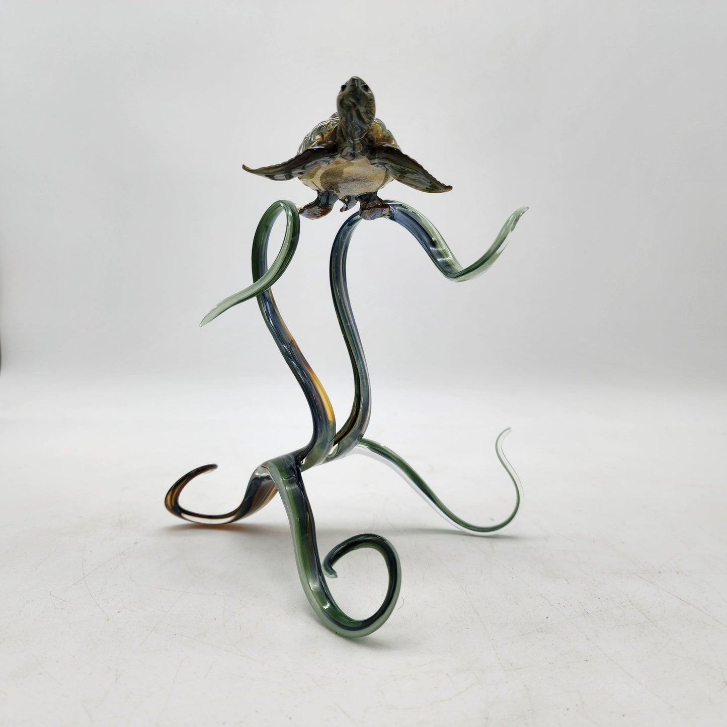Handcrafted Blown Glass Sea Turtle Sculpture With Swirling Base