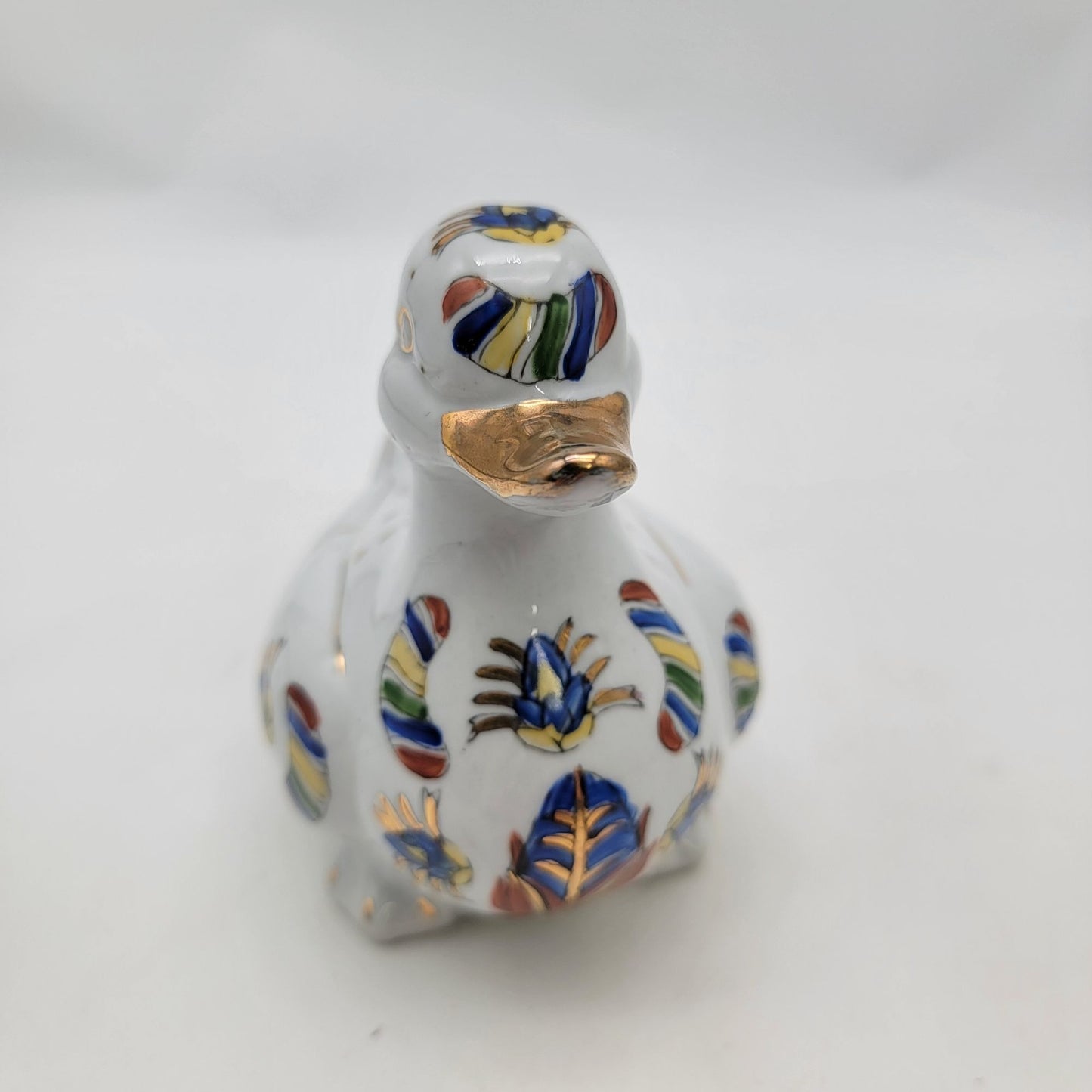 Vintage Hand-Painted Porcelain Duck Figurine With Gold Accents