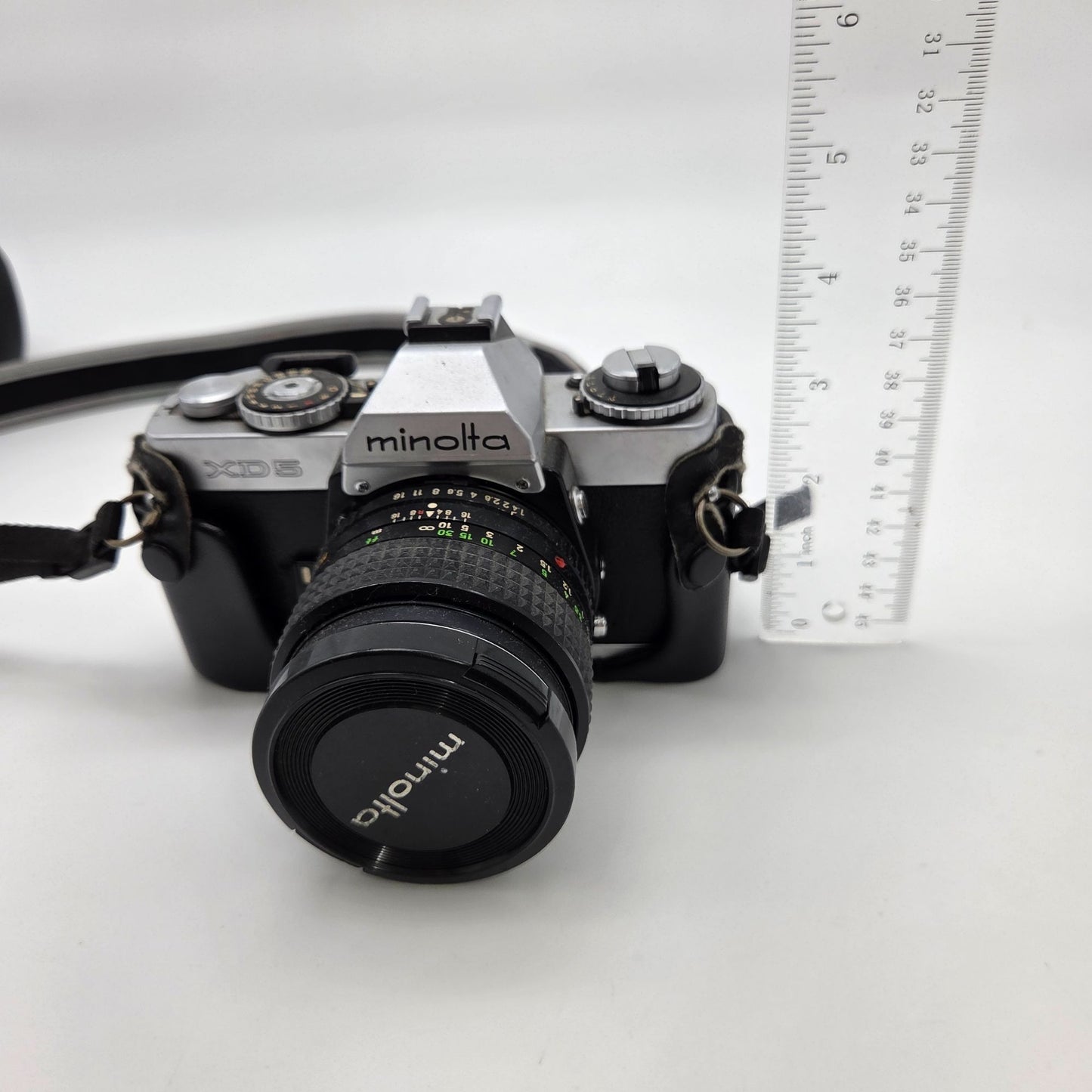 Minolta XG-1 35mm SLR Film Camera W/ 50mm Lens Pentax Leather Cover & Nikon Strap