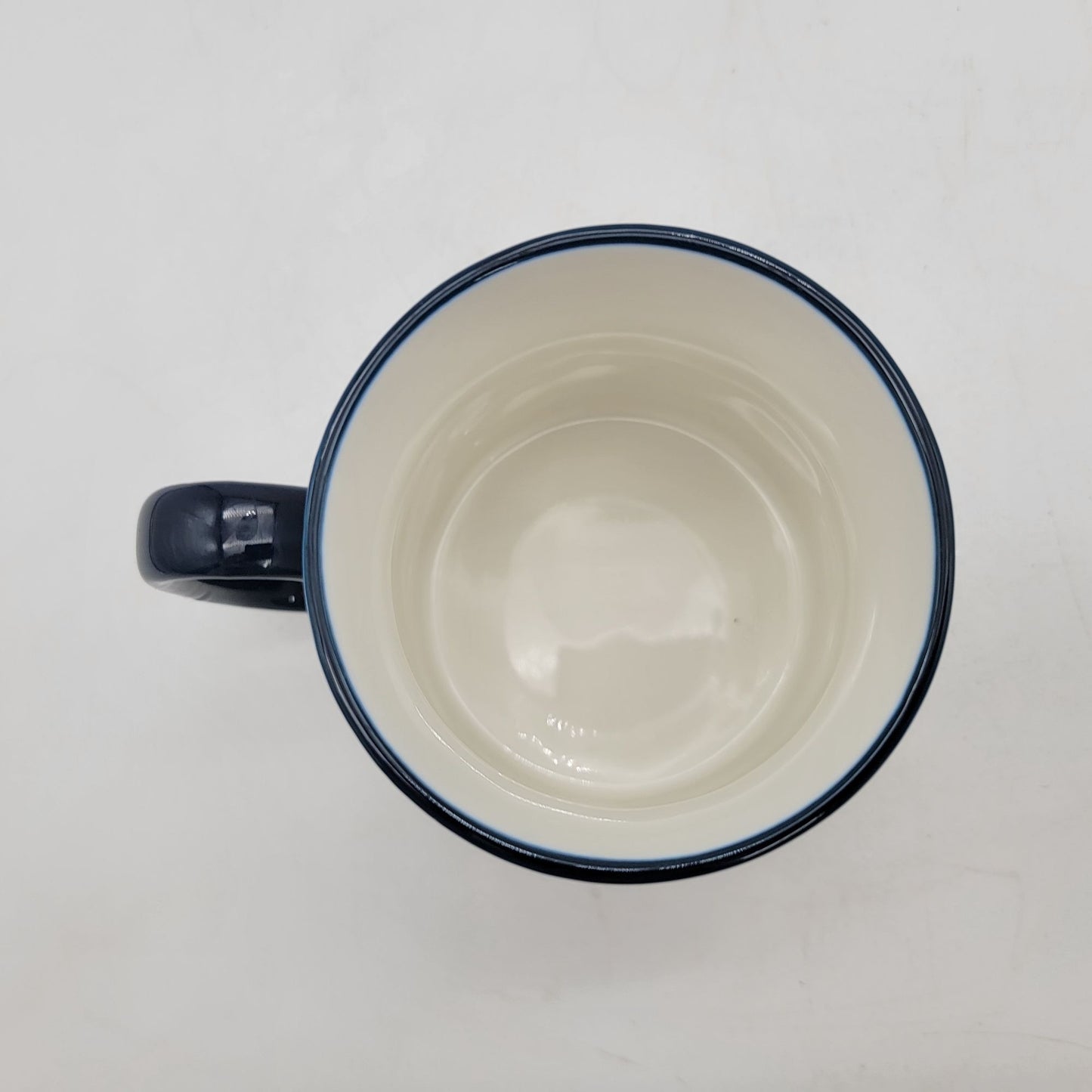 Raccoon-Themed Ceramic Mug With Navy Handle By Signature Housewares
