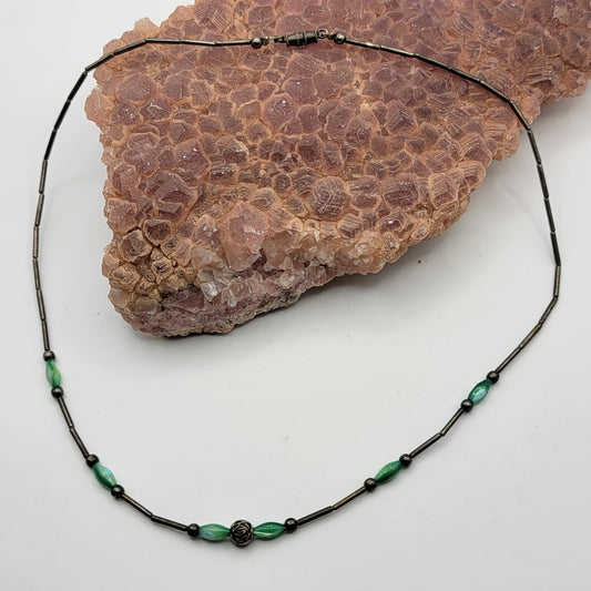 Liquid Silver Beaded Necklace with Green Accents