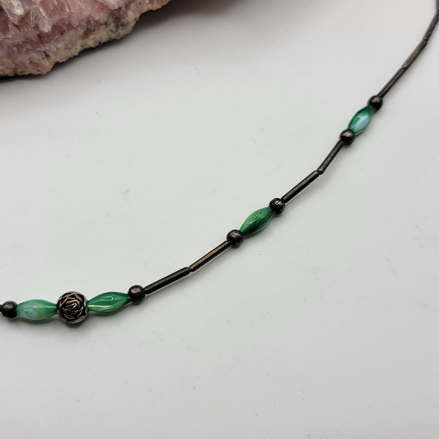 Liquid Silver Beaded Necklace with Green Accents