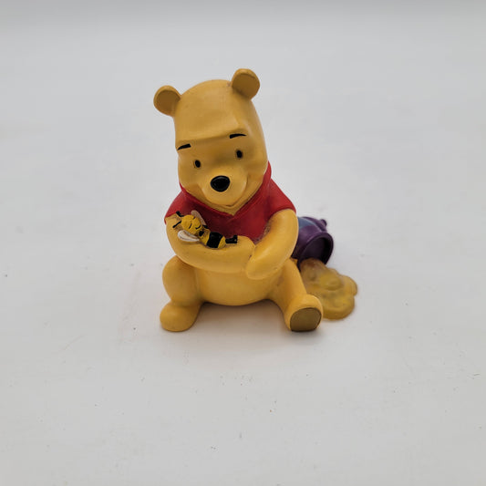 Winnie the Pooh Holding Bee Figurine