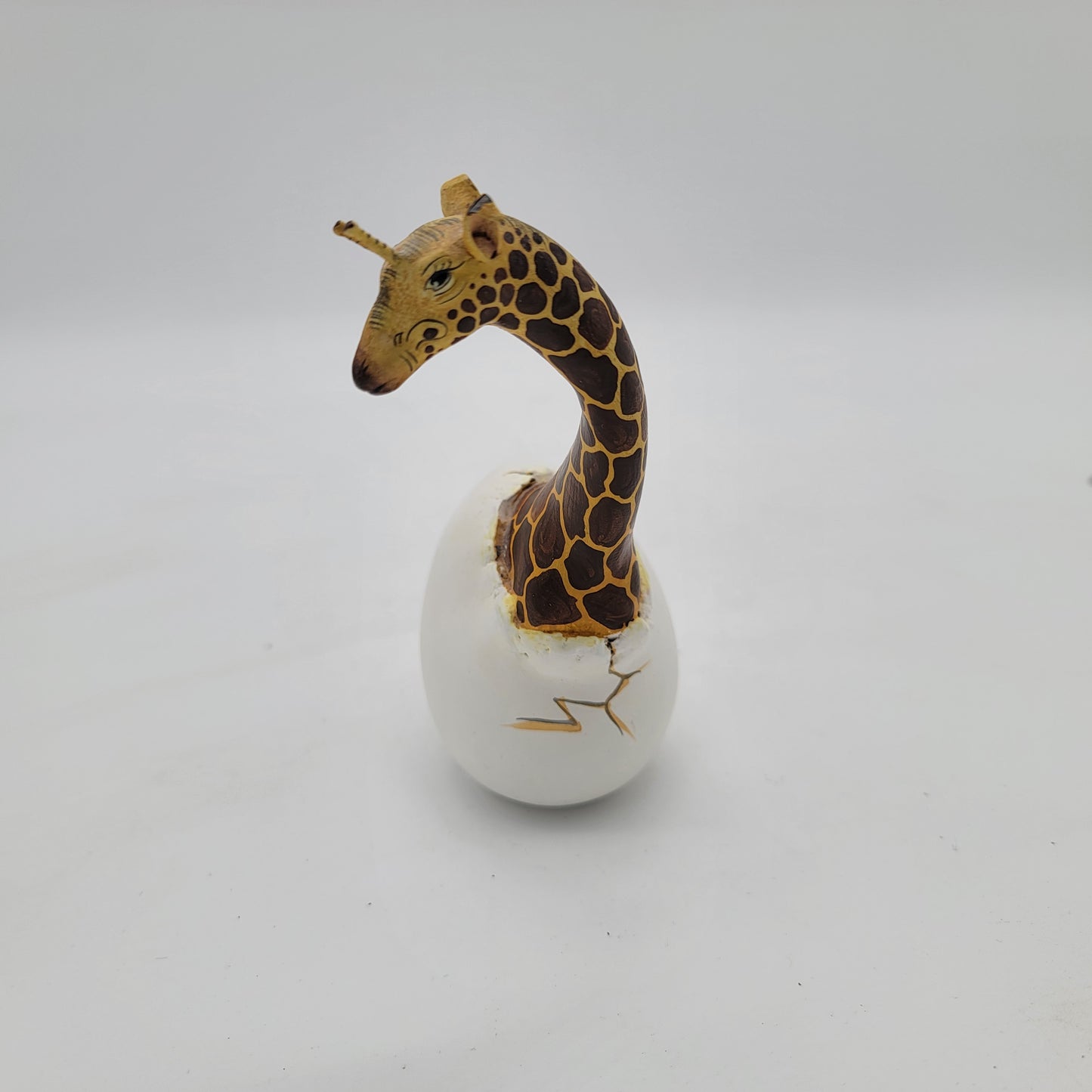 Artist Signed Giraffe Hatching from Egg