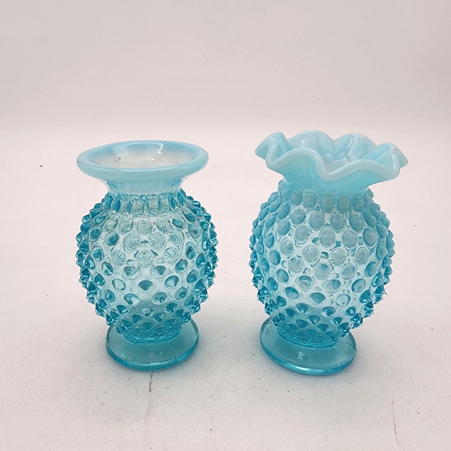 Pair of Fenton Blue Opalescent Hobnail Vases