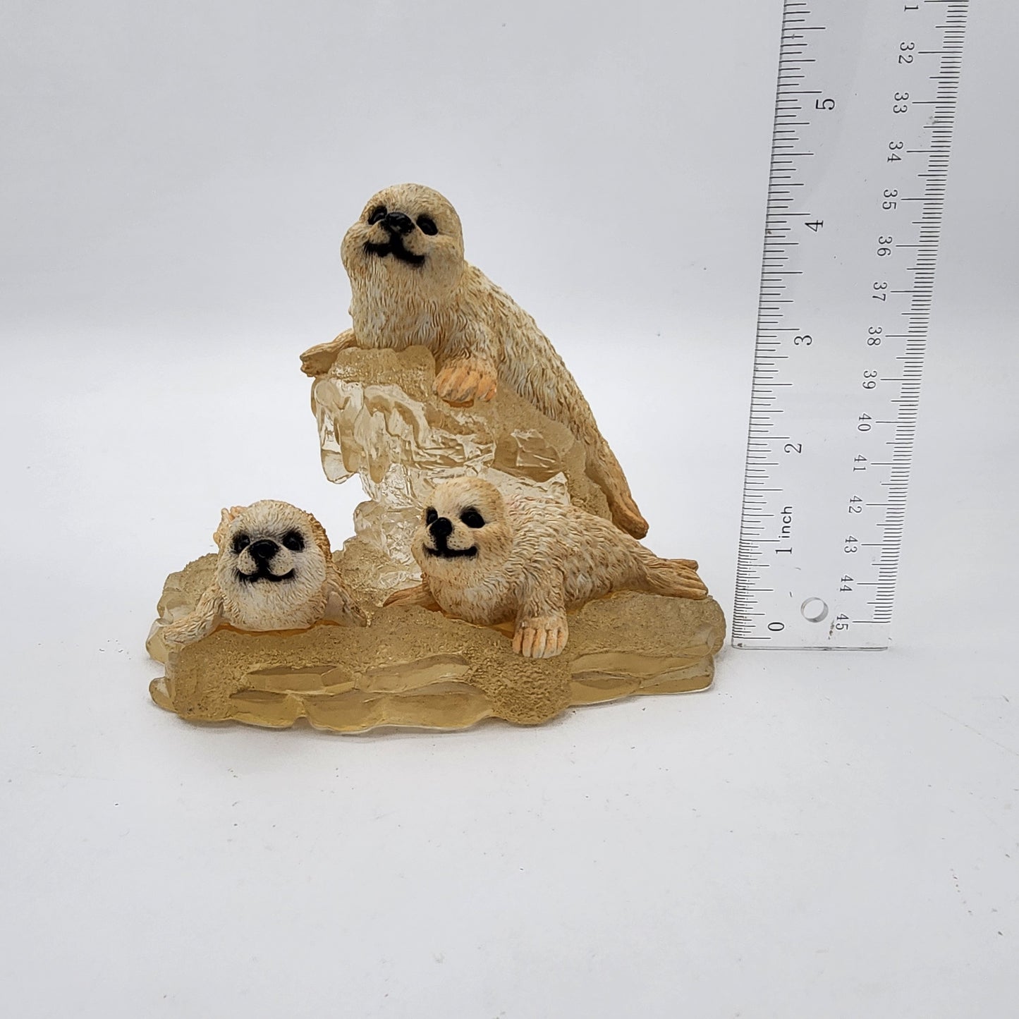 Vintage Seals on Lucite Figurine