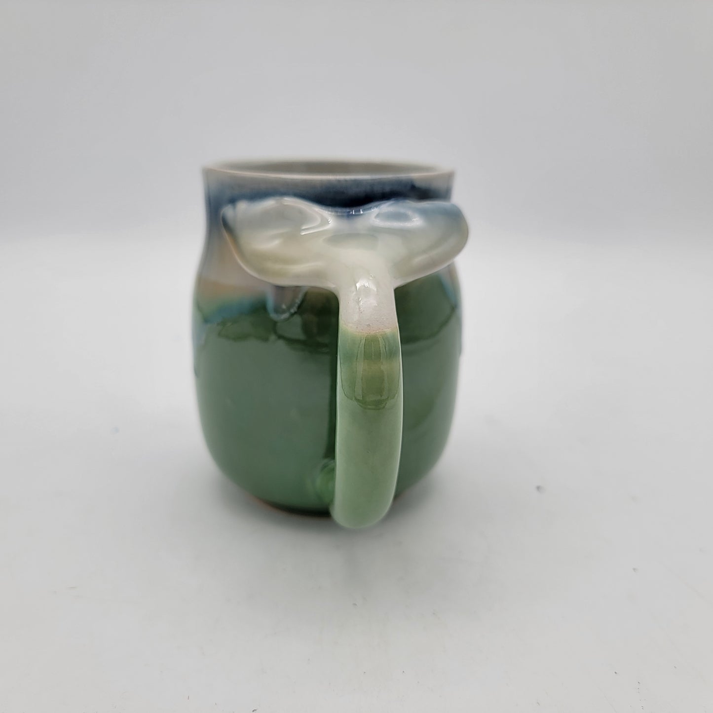 Pair of Art Pottery Whale Tale Mugs