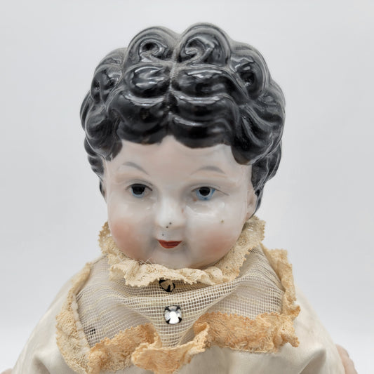 Antique China Head Lowbrow Doll on Newer Body