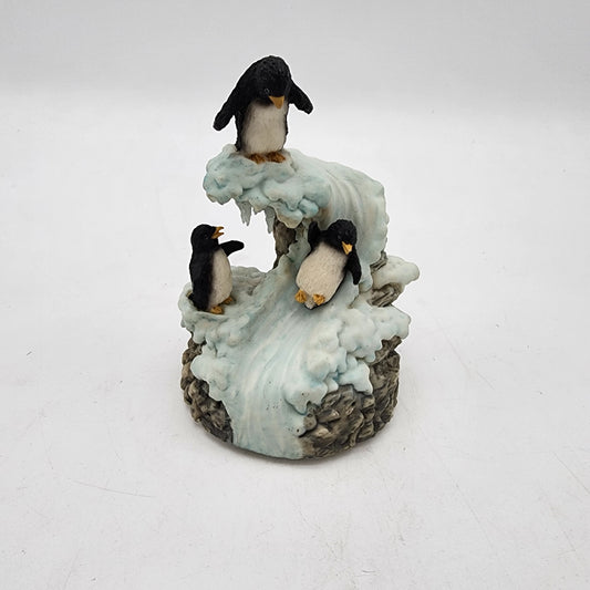 Penguins Playing Music Box