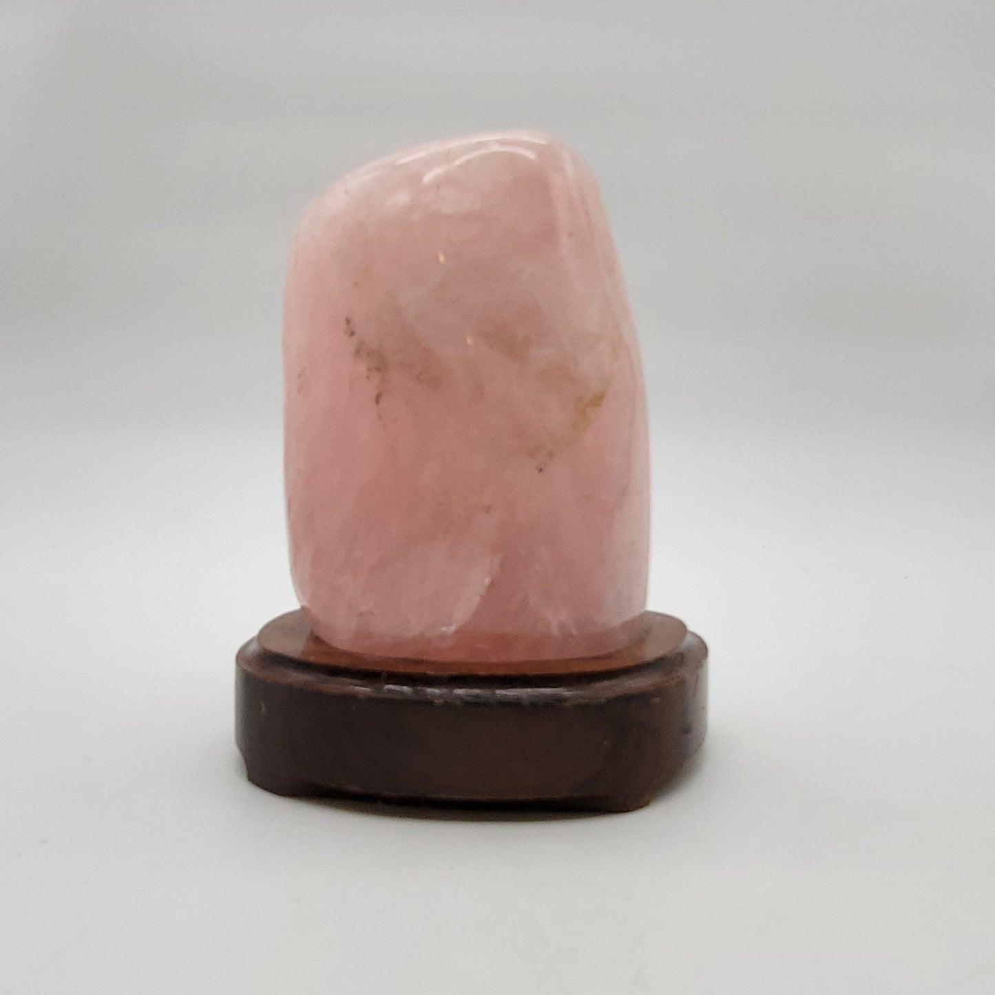 Polished Rose Quartz Crystal Specimen On Wooden Base