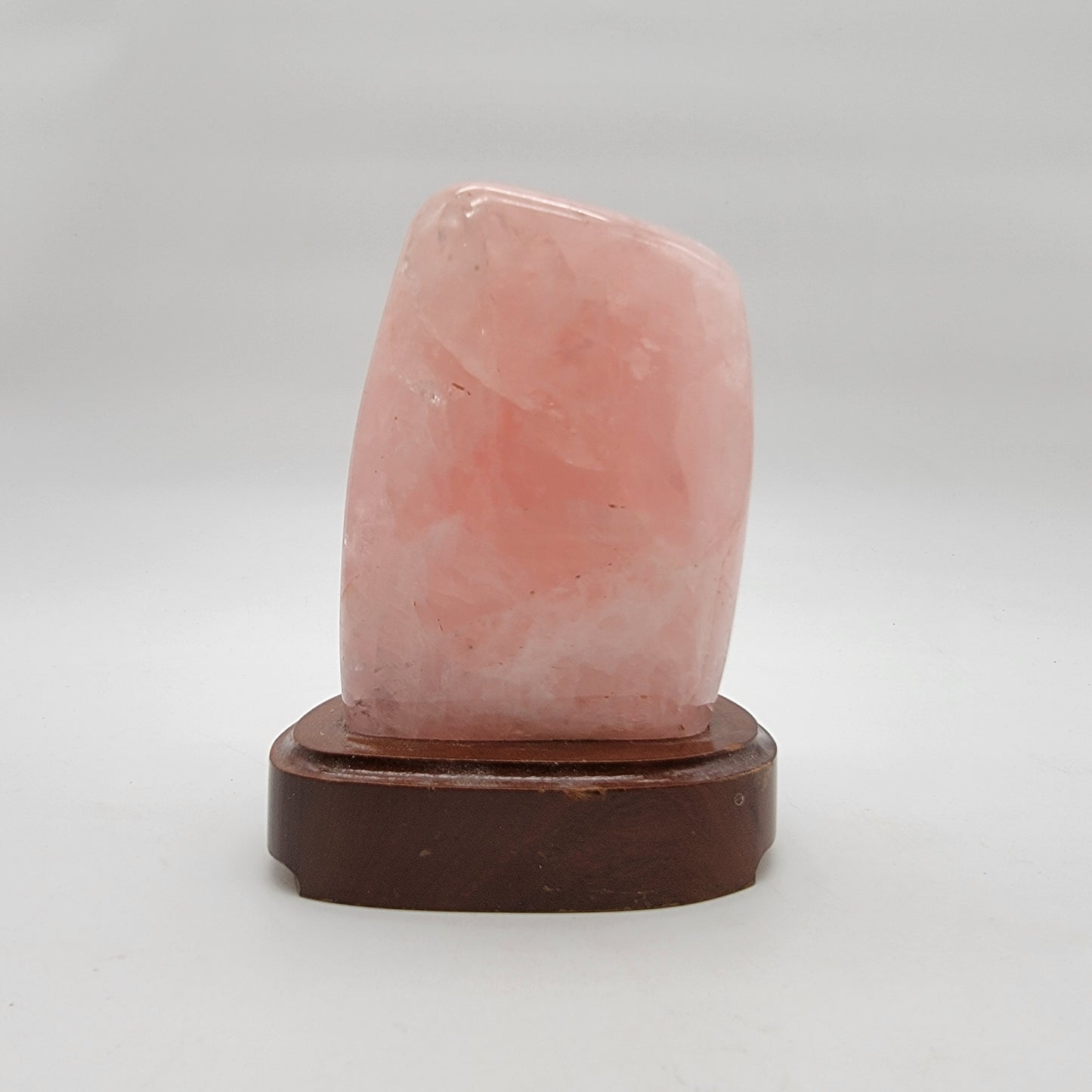 Polished Rose Quartz Crystal Specimen On Wooden Base
