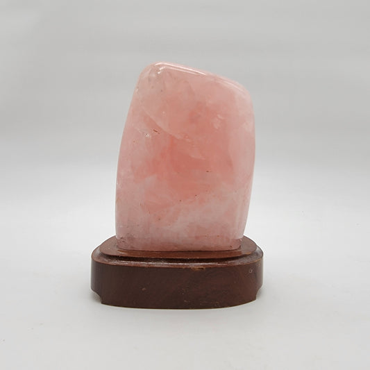 Polished Rose Quartz Crystal Specimen On Wooden Base