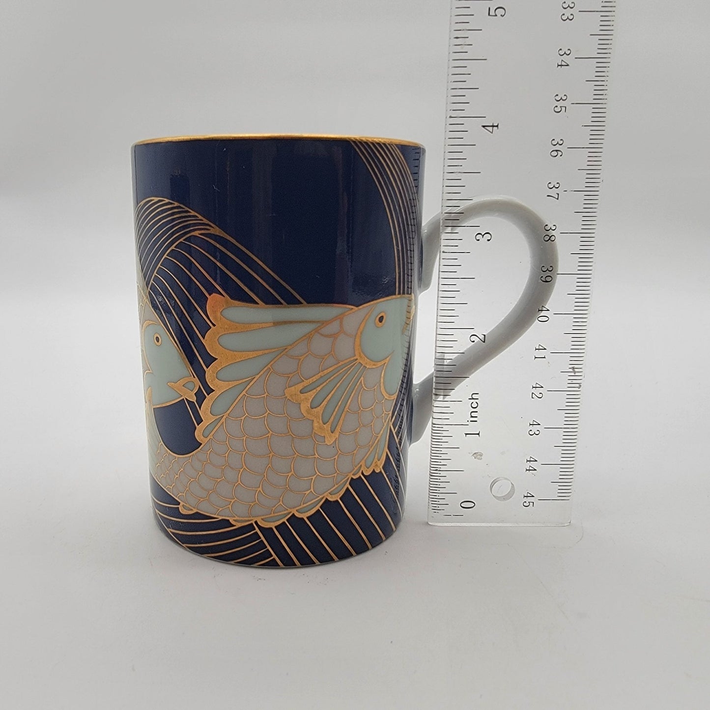 Pair of Fitz & Floyd Blue and Gold Fish La Grande Peche Porcelain Mugs