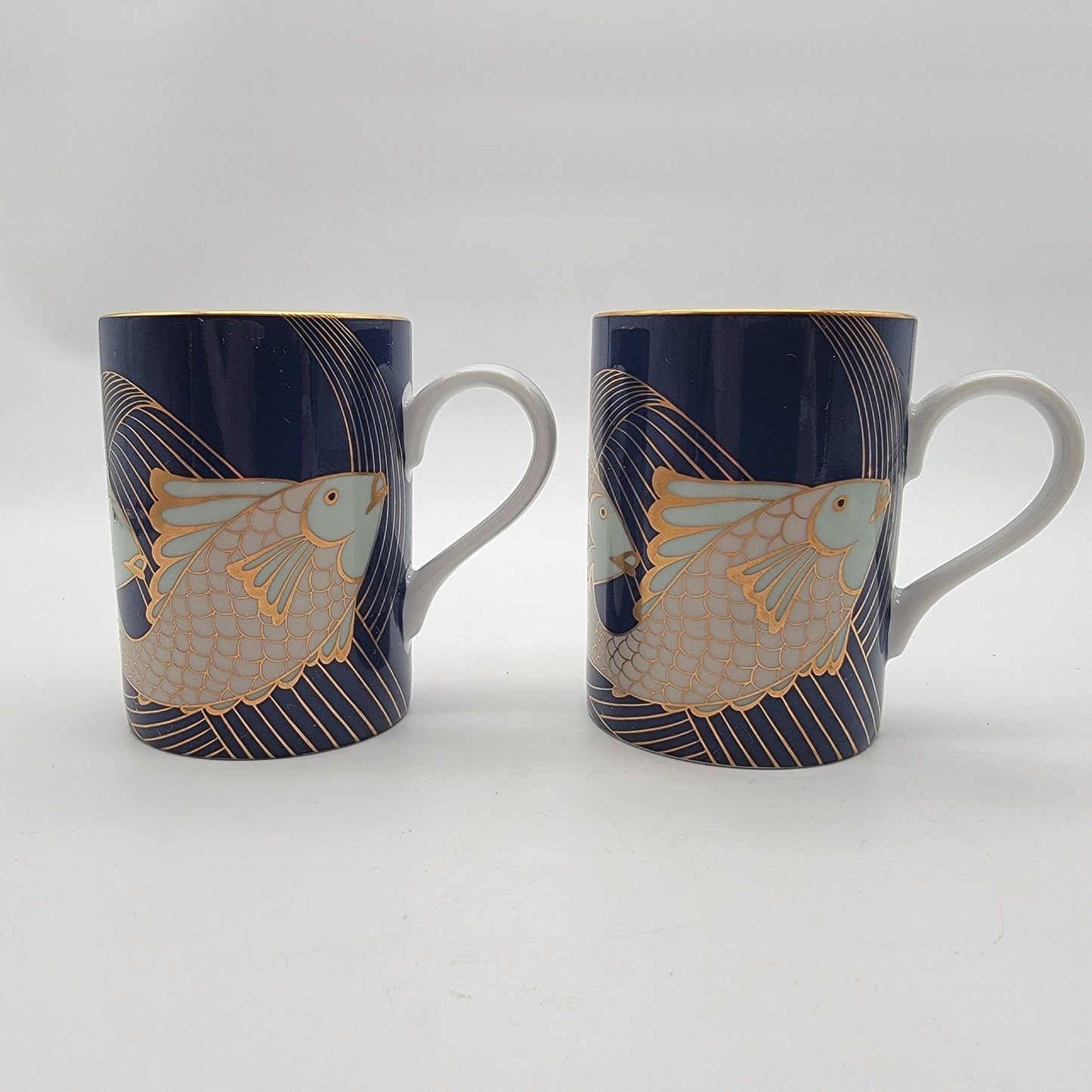 Pair of Fitz & Floyd Blue and Gold Fish La Grande Peche Porcelain Mugs