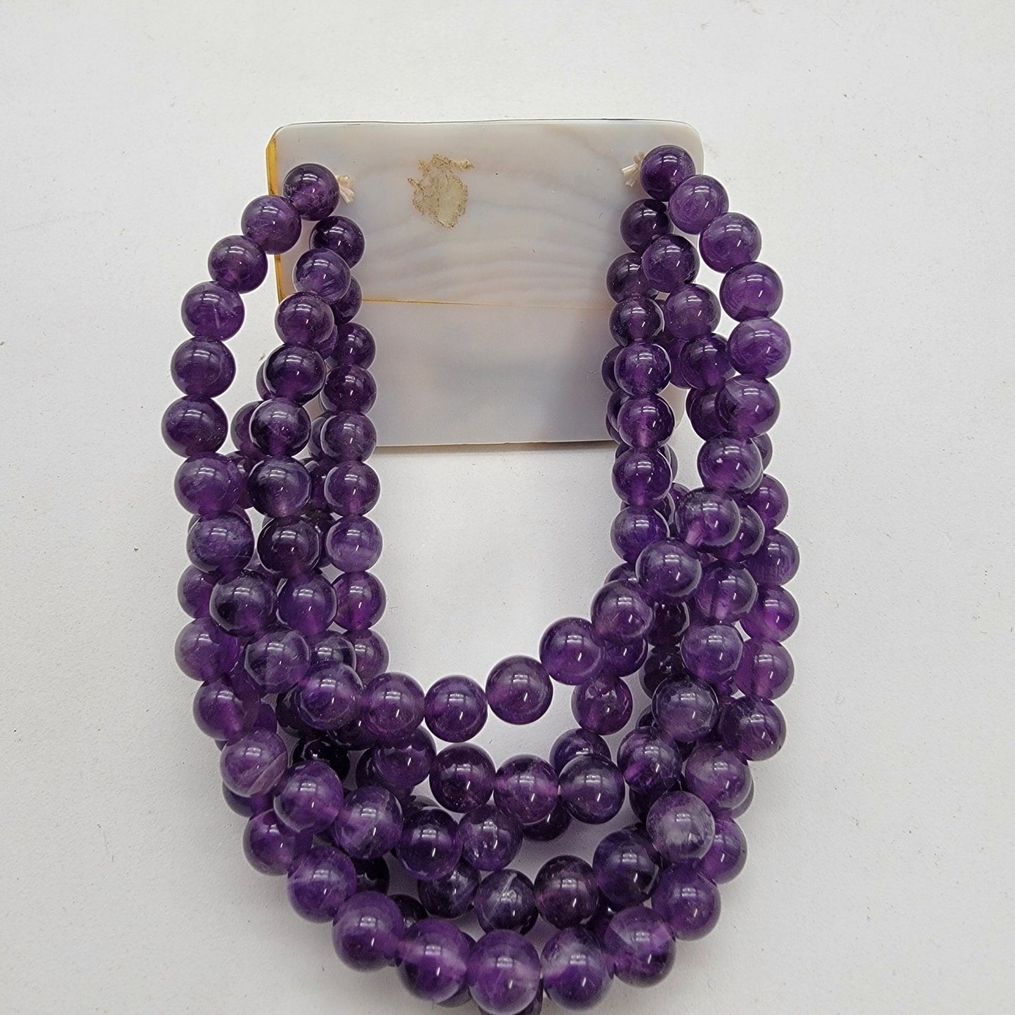 Multi-Strand Amethyst Gemstone Beaded Bracelet With Abalone Shell Panel