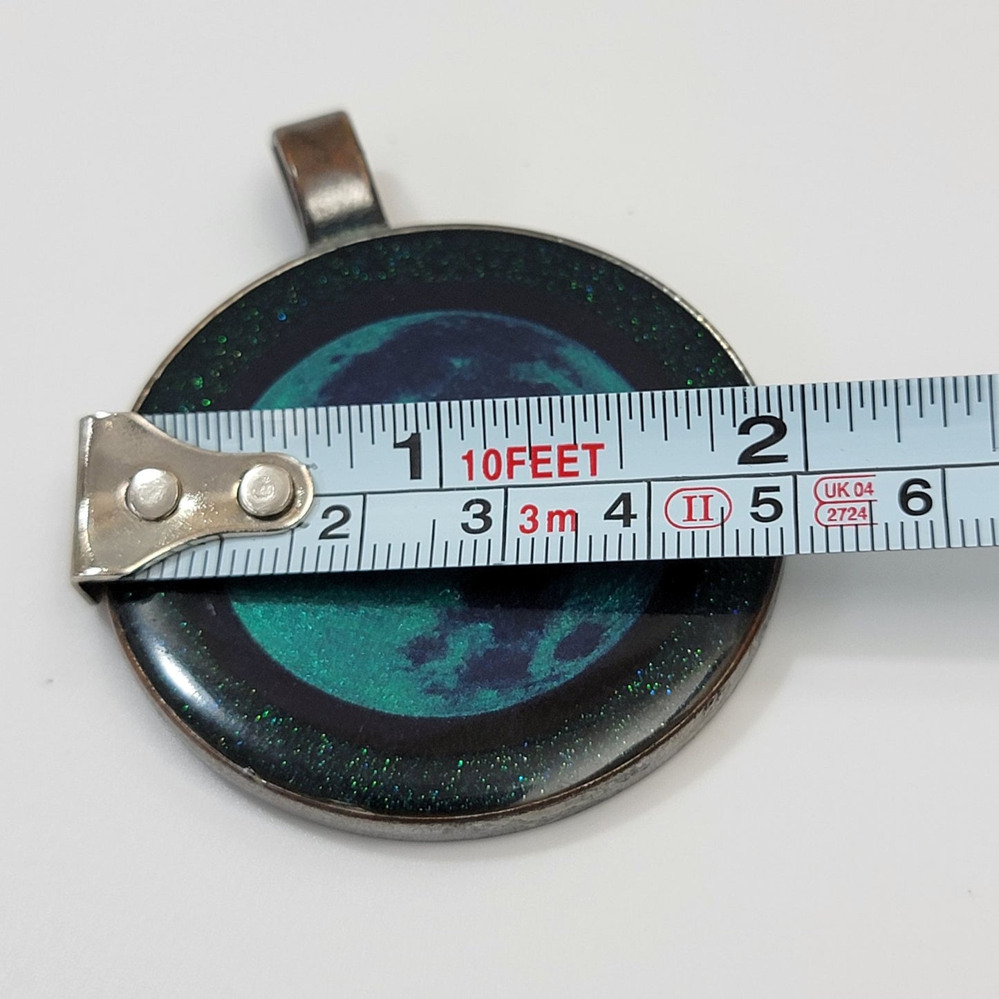 Luminescent Moon Earth Night Sky Metal Pendant
