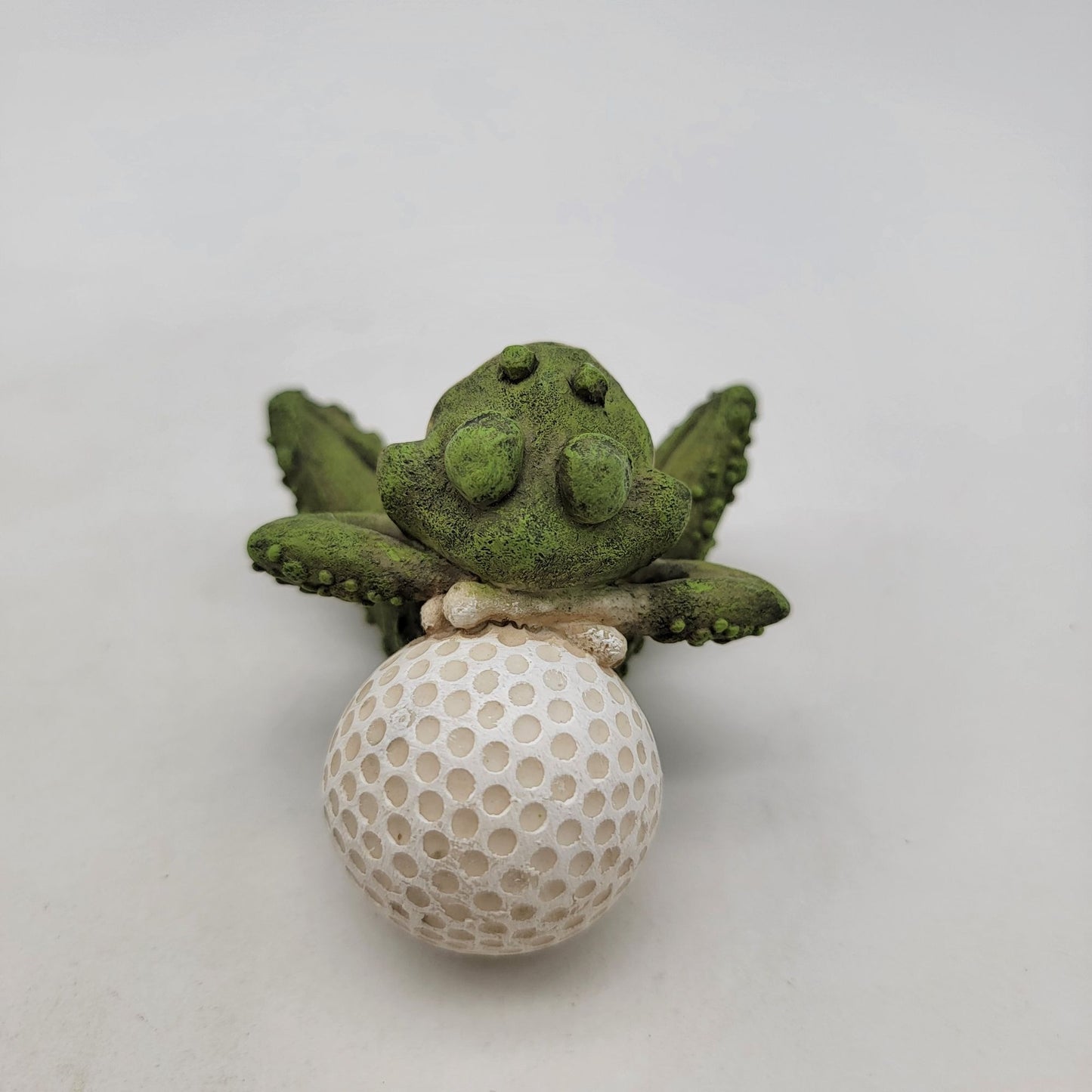 Whimsical Vintage Frog Relaxing On Golf Ball Figurine