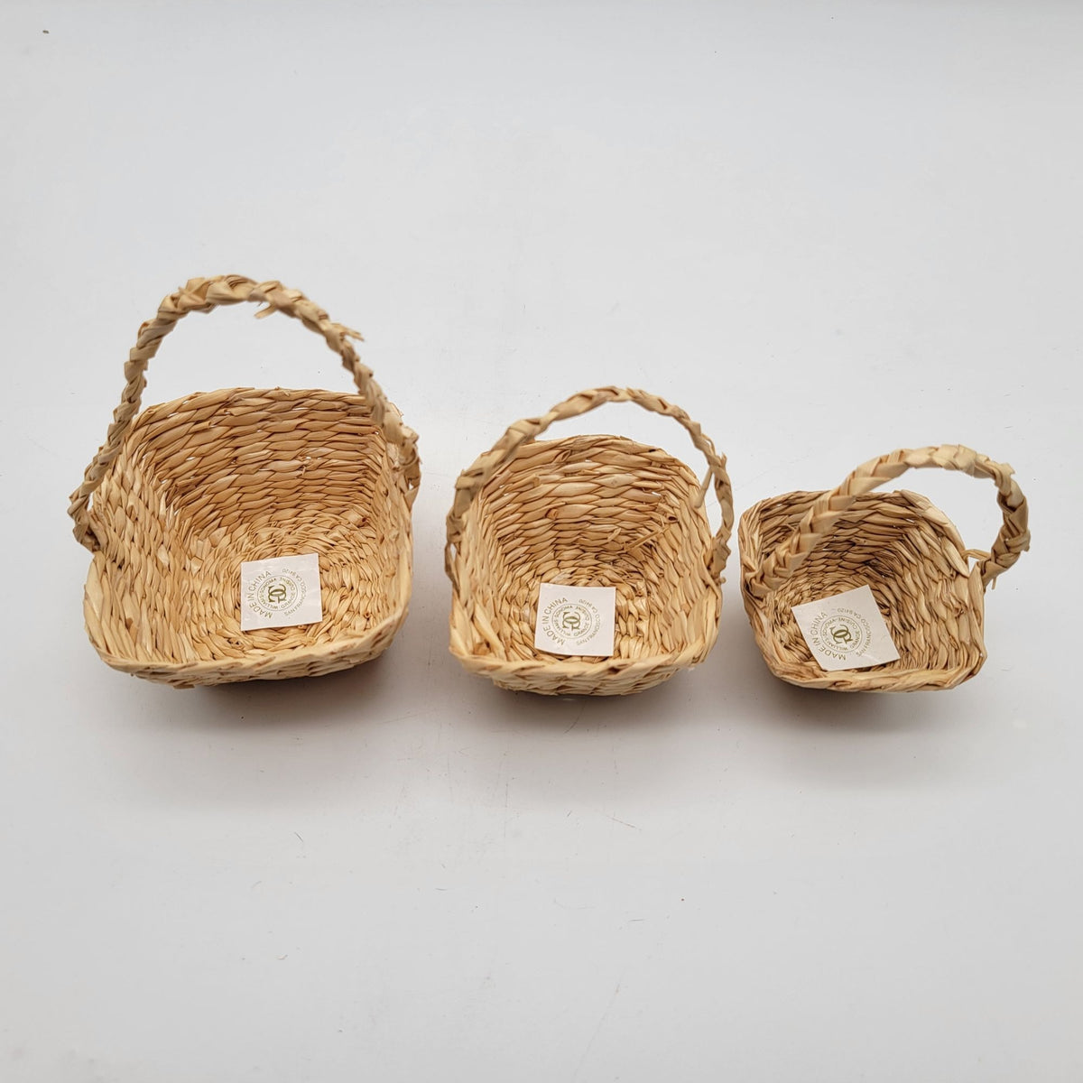 Set Of 3 Nesting Woven Willow Straw Baskets