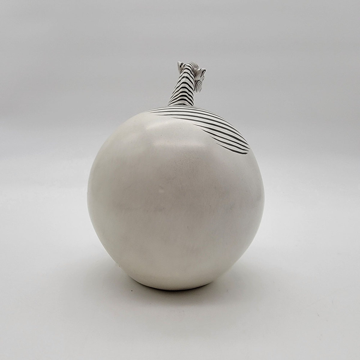 Zebra Hatching From Egg Ball Figurine