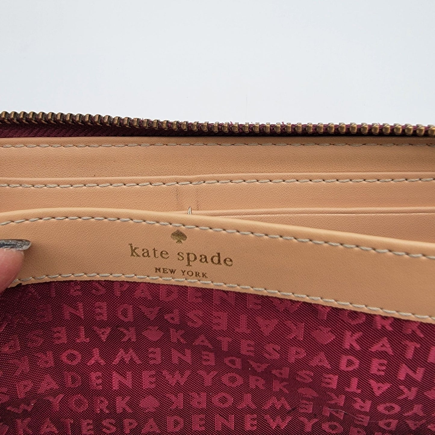 Kate Spade New York Burgundy Pebbled Leather Neda Zip-Around Wallet