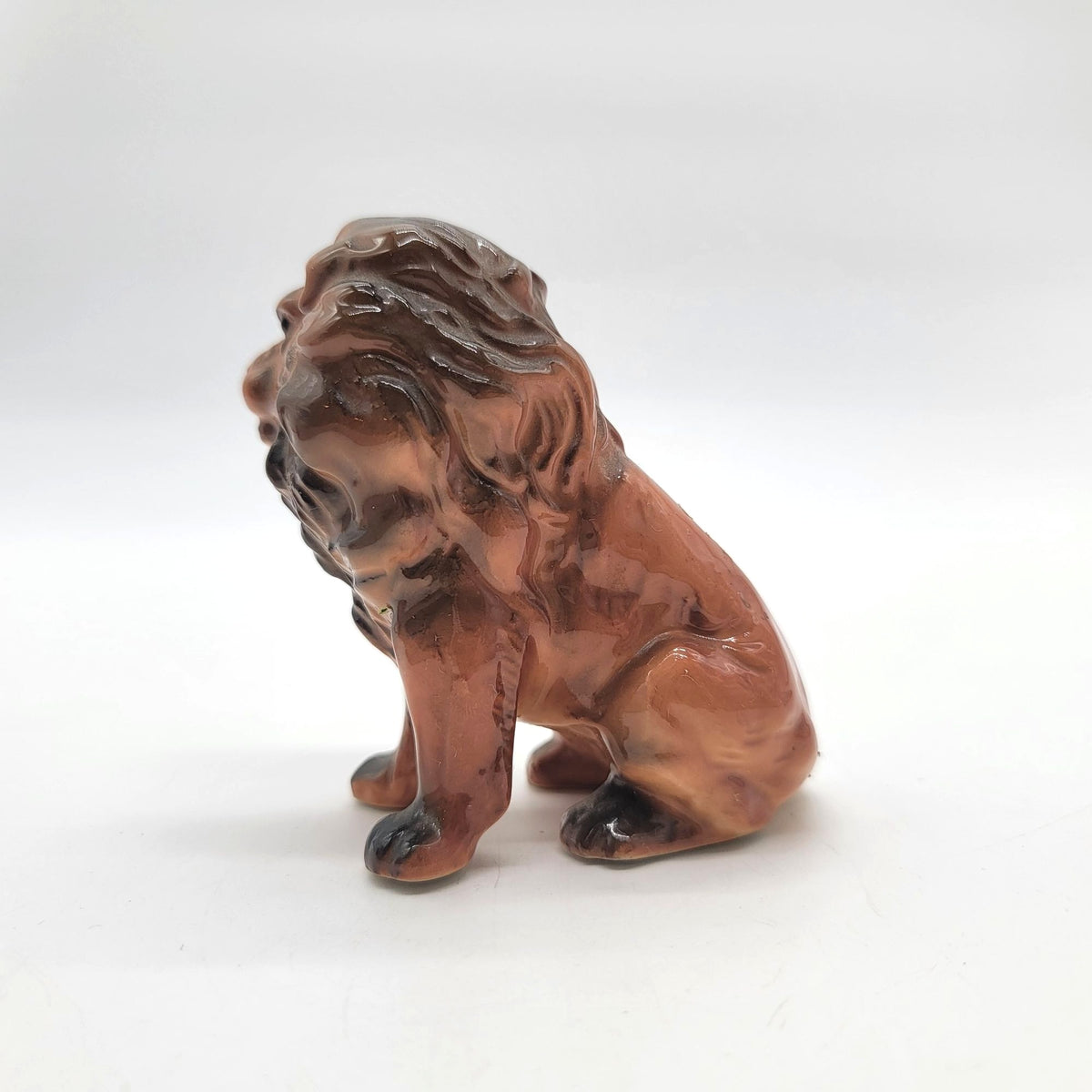 Mid-Century Porcelain Sitting Lion Figurine