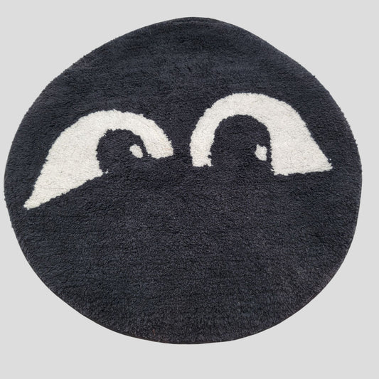 Black Tufted Round Rug Peeking Eyes