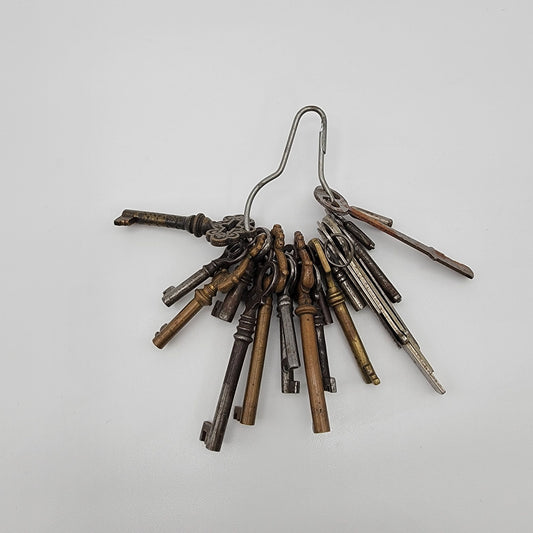 Antique Cast Iron Skeleton Key Set On Wire Hanger