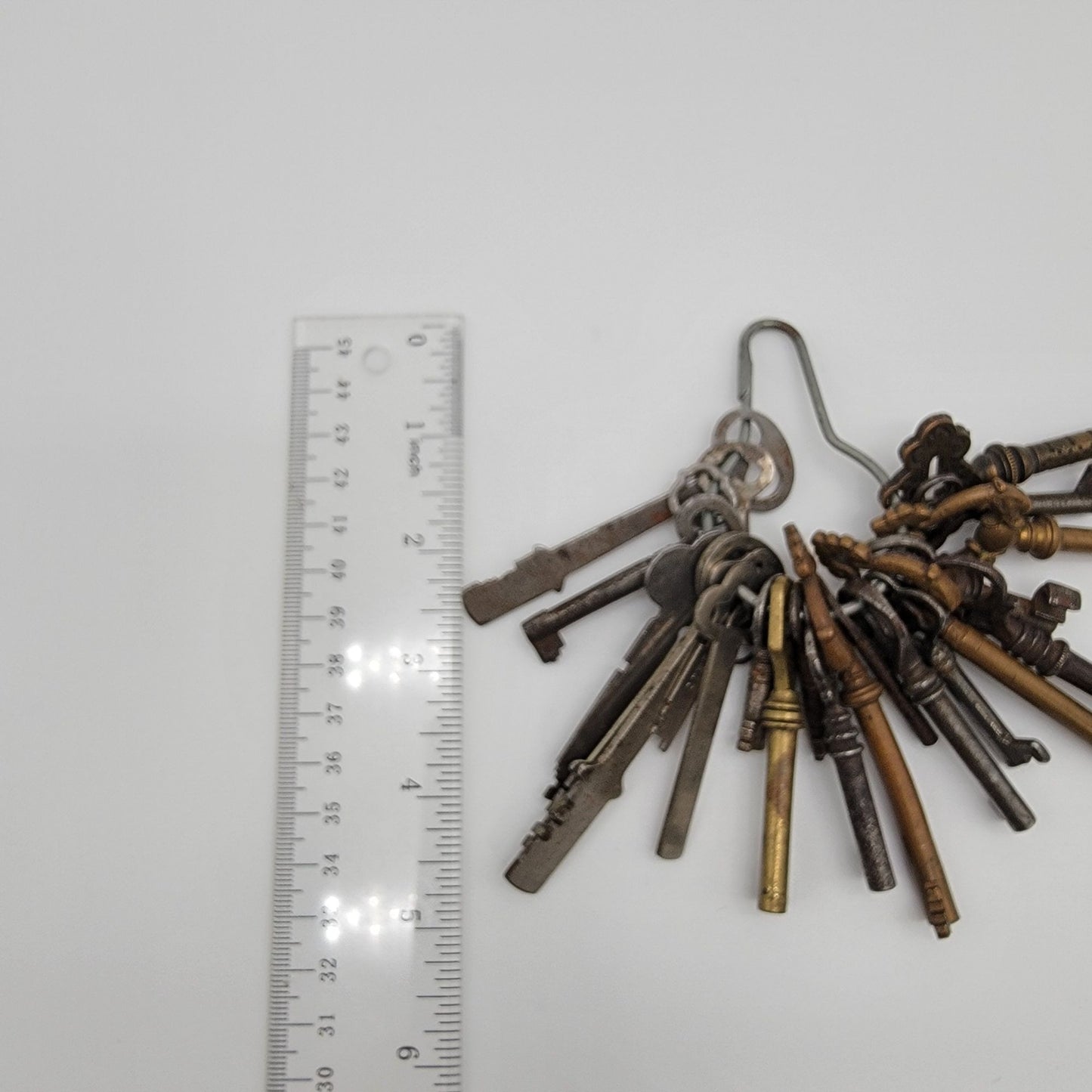 Antique Cast Iron Skeleton Key Set On Wire Hanger