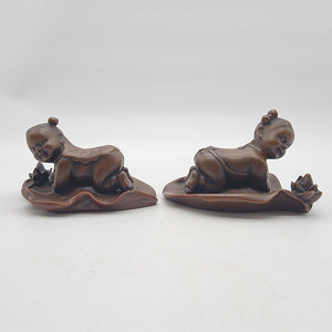 Pair Of Vintage Asian Boxwood Lotus Child Carvings