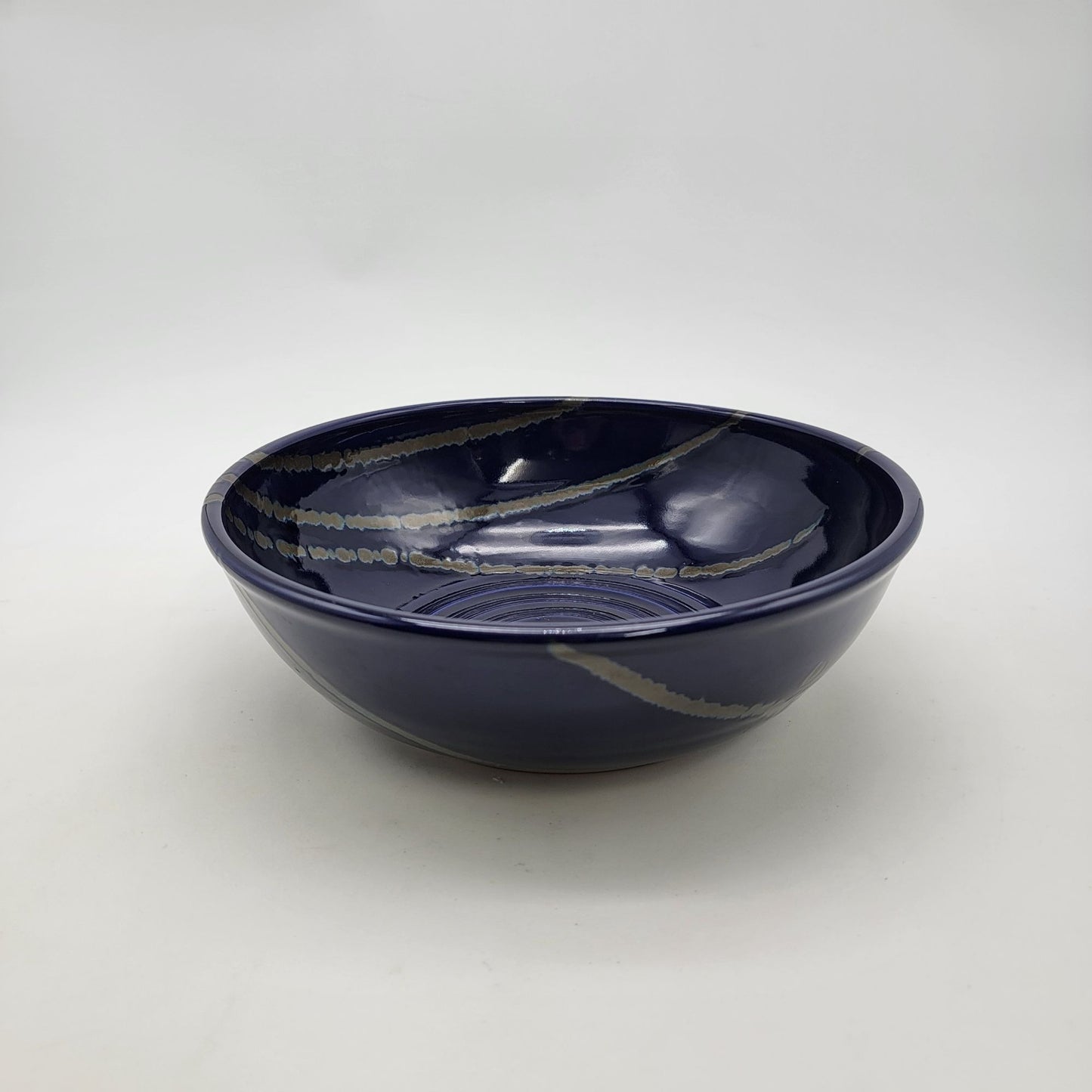 Signed Blue Art Pottery Bowl  With Spiral Pattern & Glazed Accents