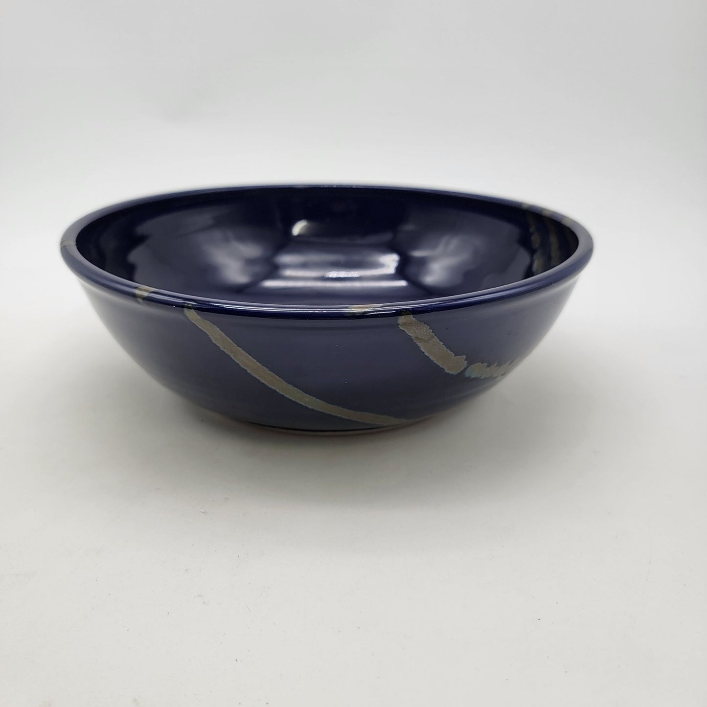 Signed Blue Art Pottery Bowl  With Spiral Pattern & Glazed Accents