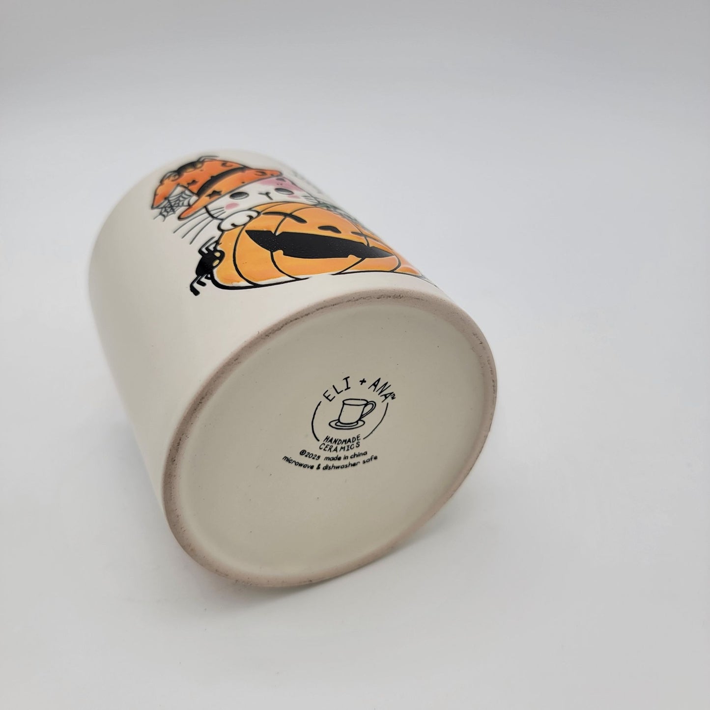 Halloween Cat with Smiling Pumpkin Mug by Eli & Ana