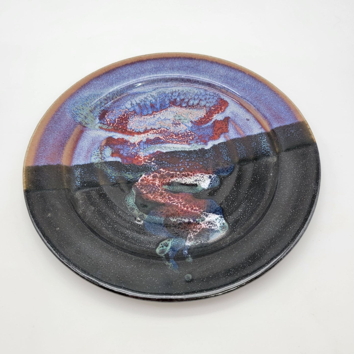 Bruce Larrabee Art Pottery Plate With Abstract Tornado Design