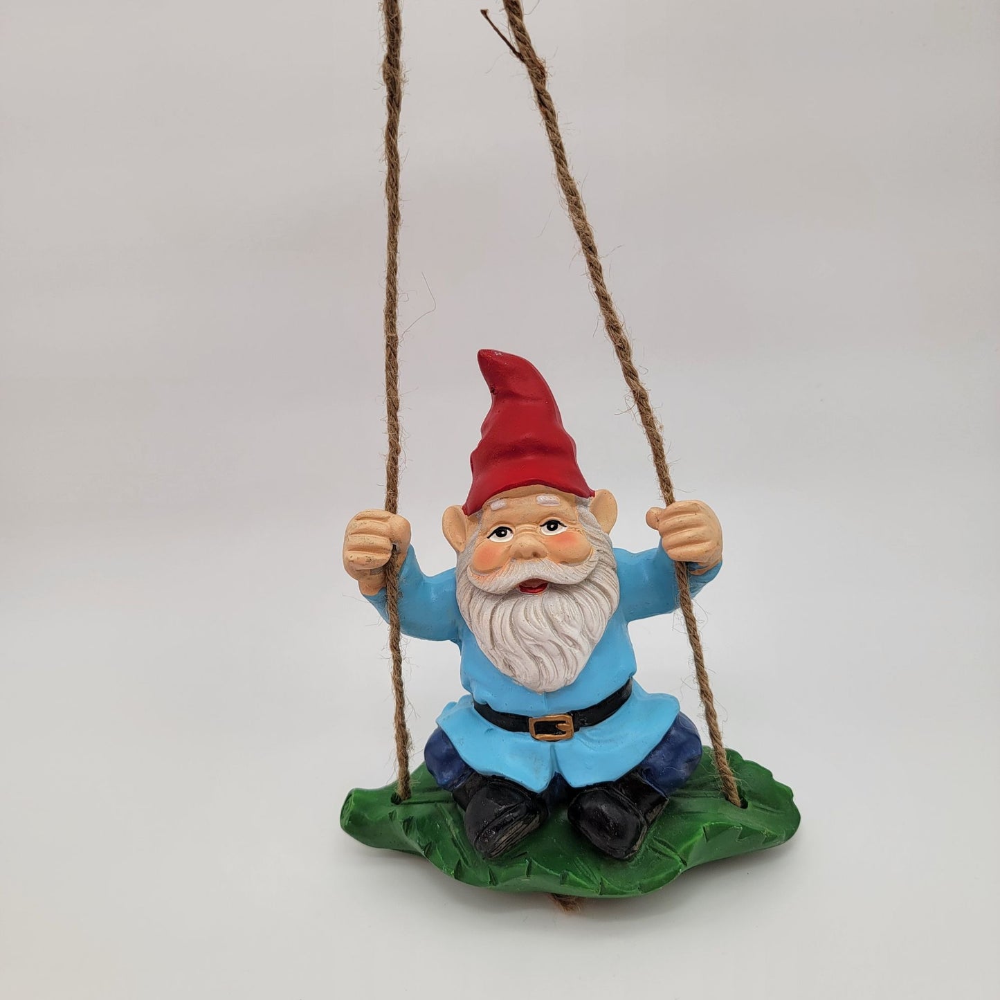 Gnome Swinging On Leaf Garden Statue