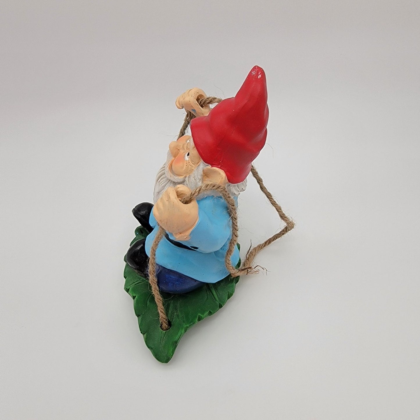 Gnome Swinging On Leaf Garden Statue