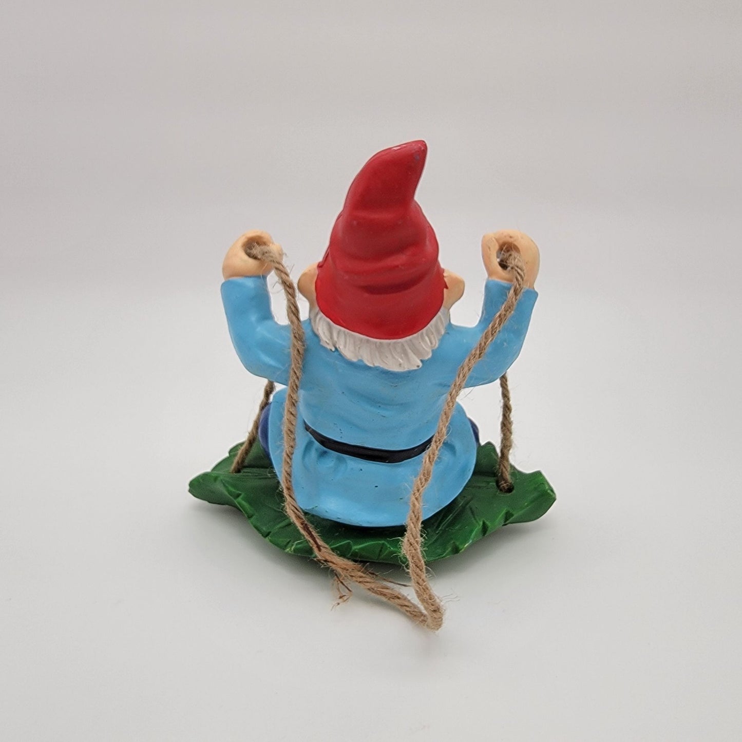 Gnome Swinging On Leaf Garden Statue