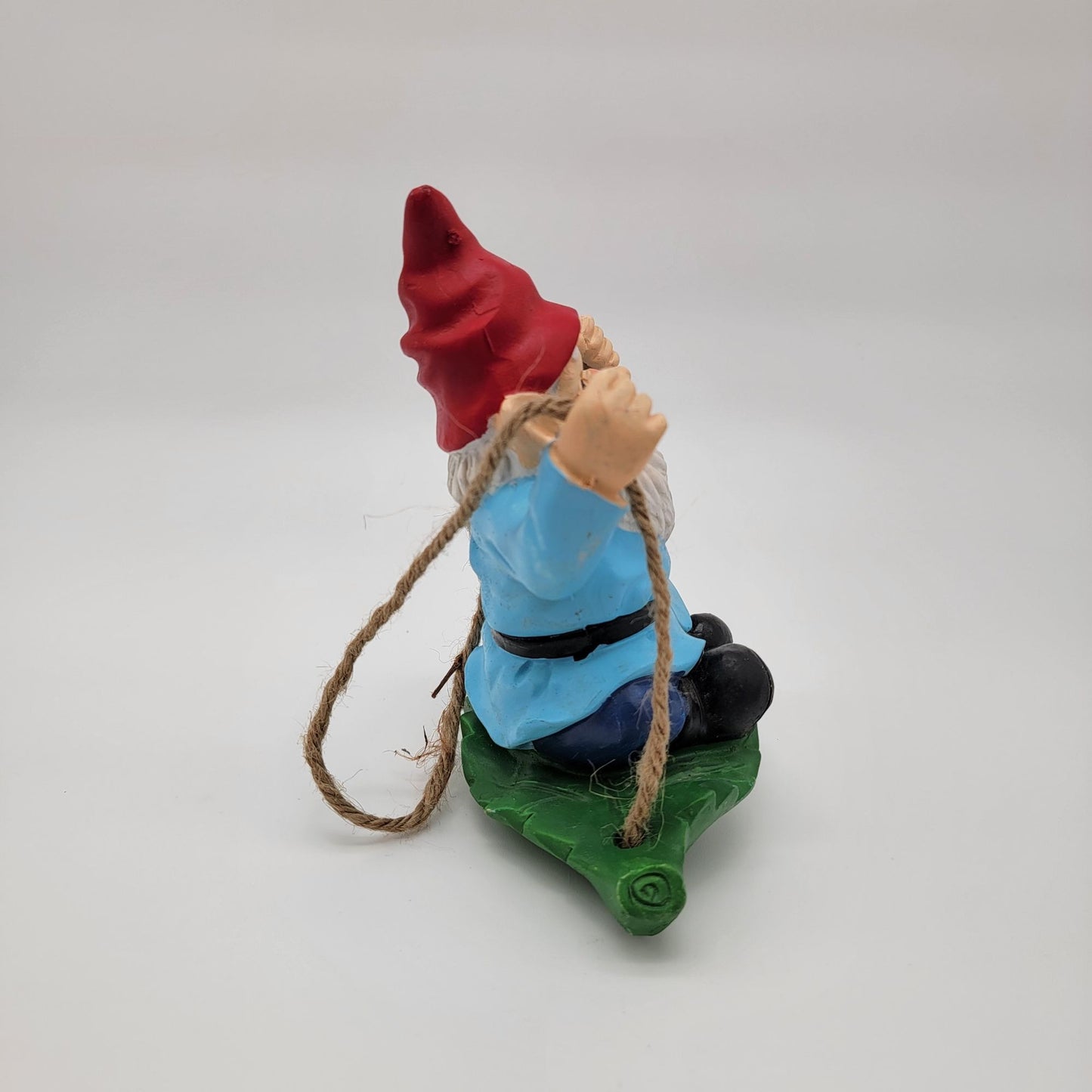 Gnome Swinging On Leaf Garden Statue
