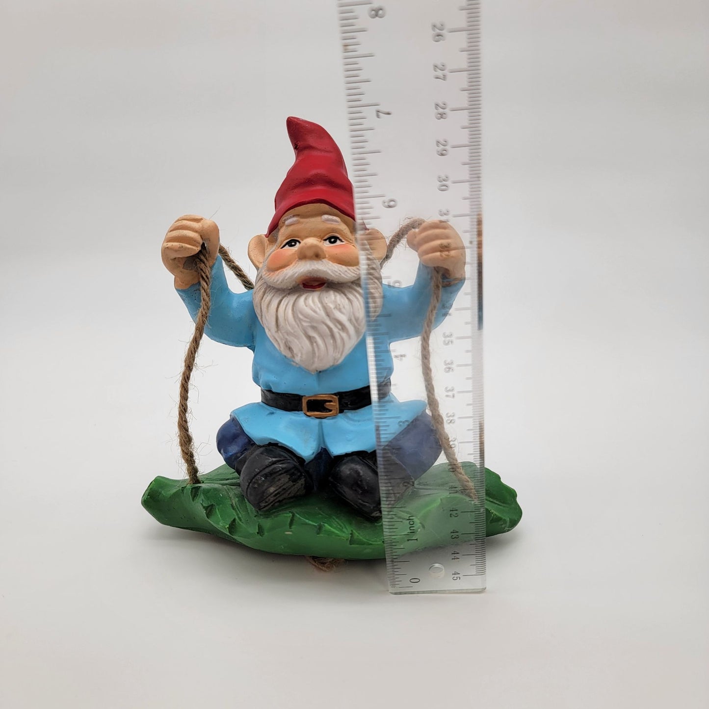 Gnome Swinging On Leaf Garden Statue