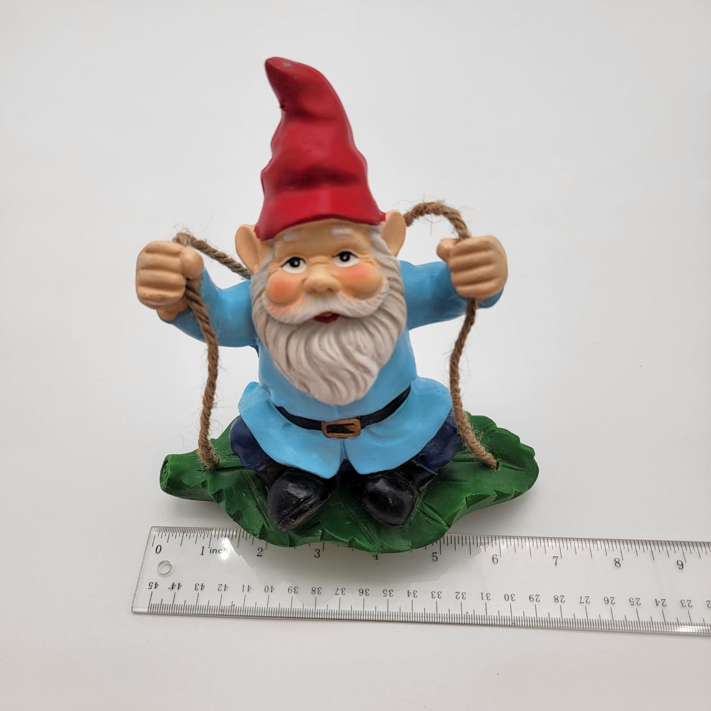 Gnome Swinging On Leaf Garden Statue