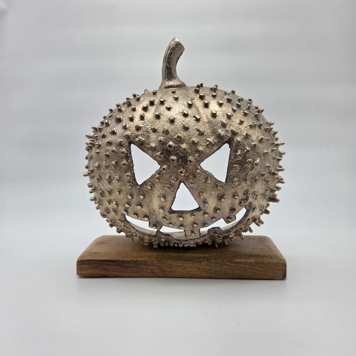 Studded Metal Jack O Lantern Sculpture On Wood Base