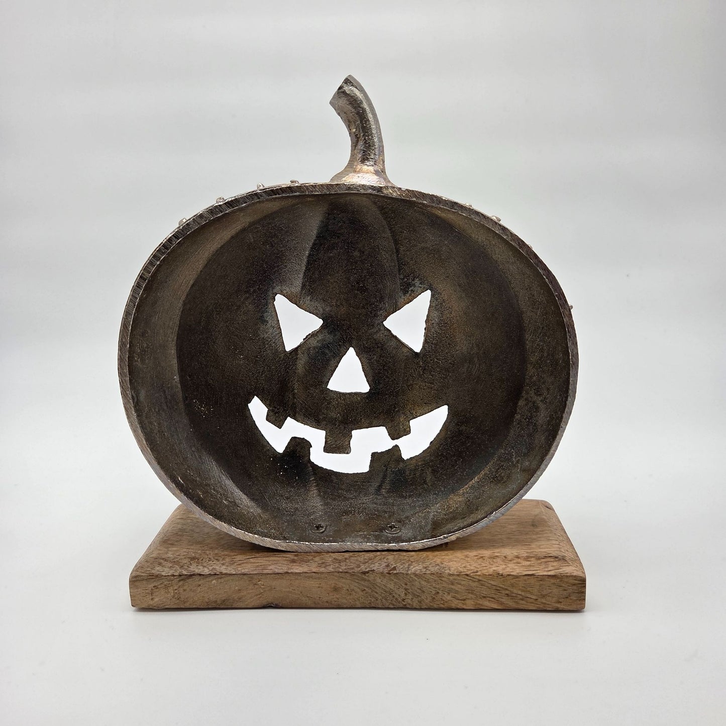 Studded Metal Jack O Lantern Sculpture On Wood Base