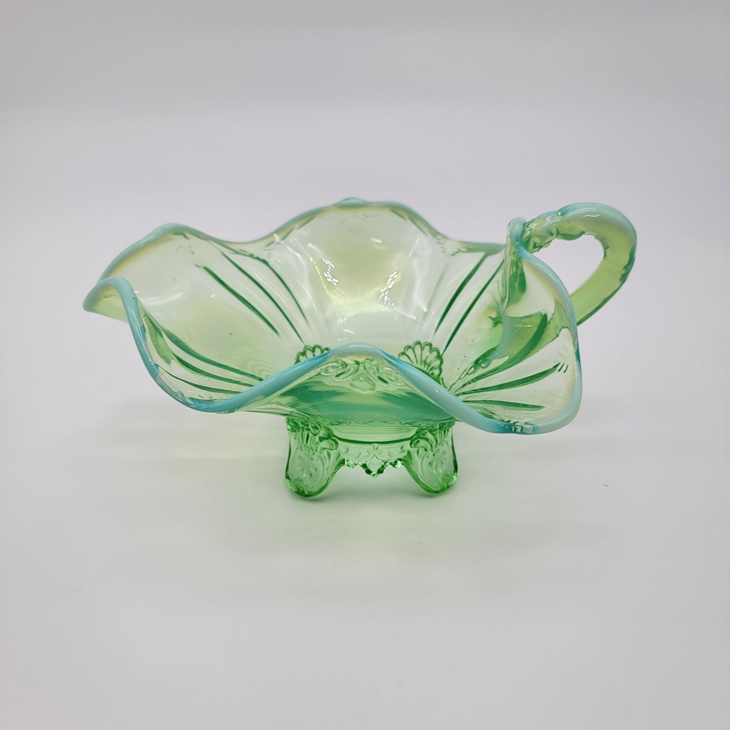 Dugan Green Opalescent Glass Footed Nappy Dish With Handle